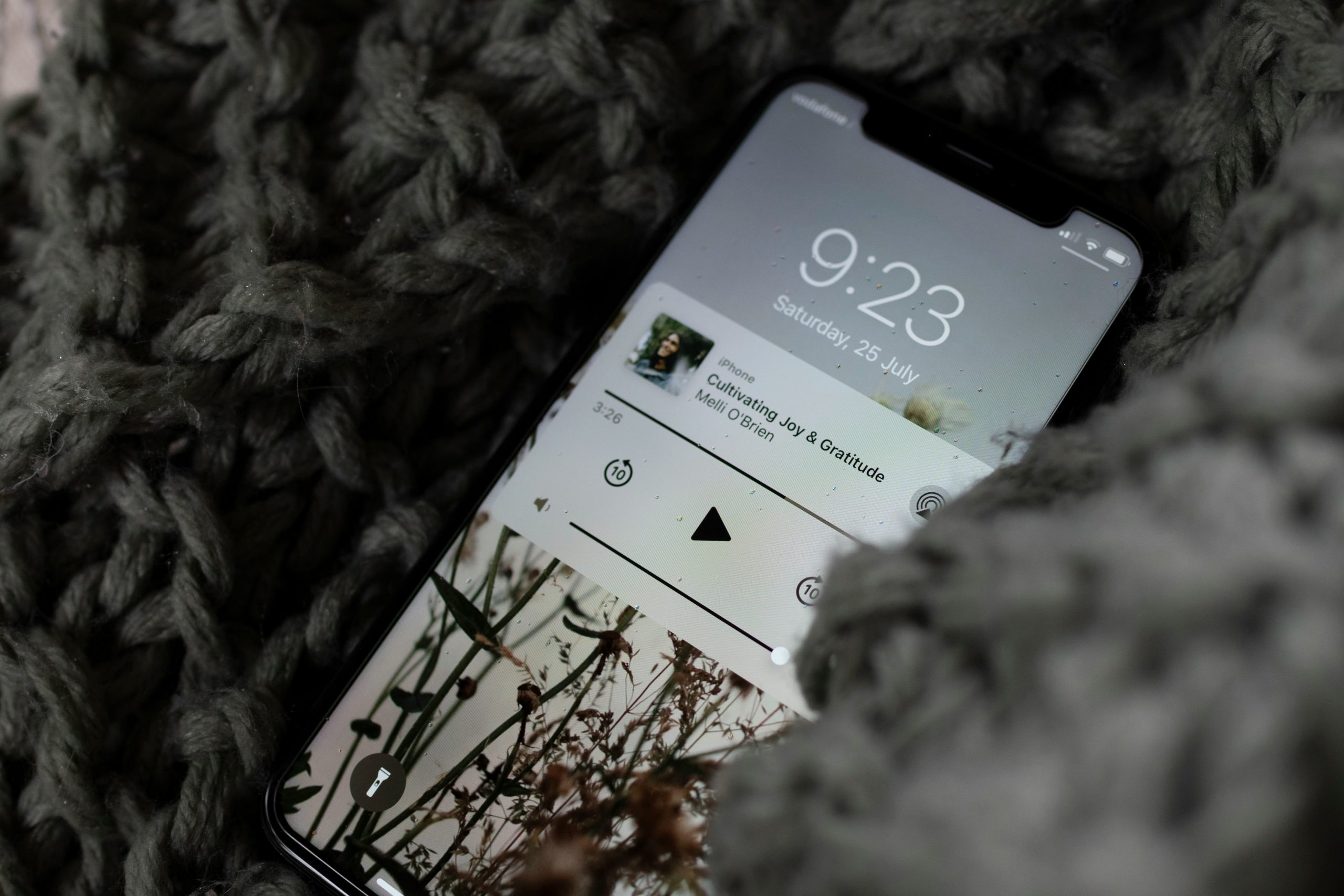 Person using a hypnosis app on a smartphone