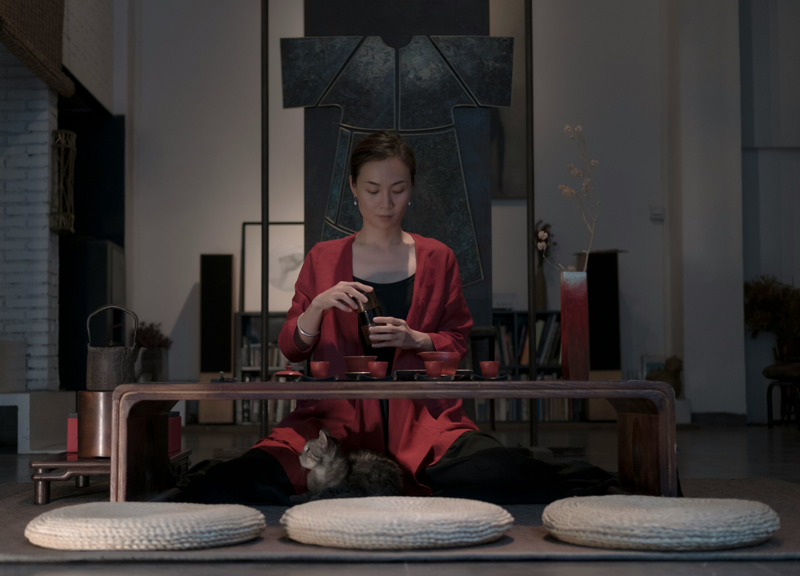 woman meditating with phone